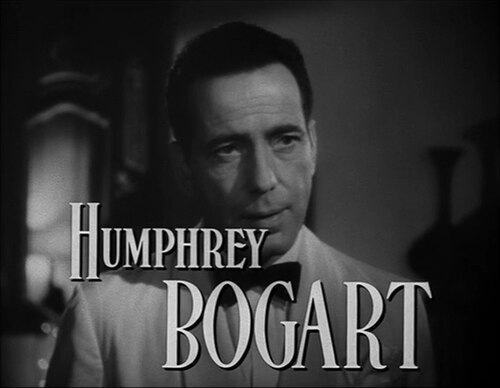 Humphrey Bogart as Rick Blaine in Casablanca (1942) — wearing his famous white dinner jacket
